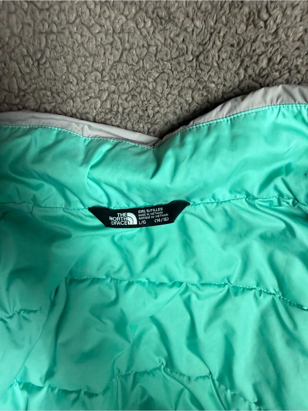 The North Face girls Grey Quilted Insulated Jacket
